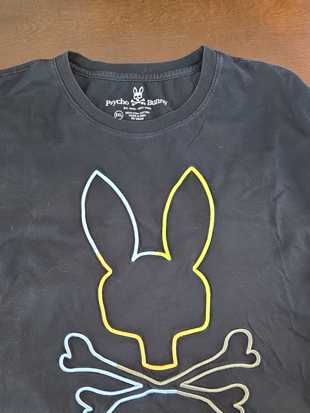 Psycho Bunny Black Short Sleeve Tee with Neon Yellow & Light Blue Outline